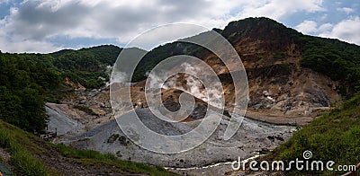 Smoke vents escaping from the earthâ€™s surface in Hell Valley Jigokudani Stock Photo